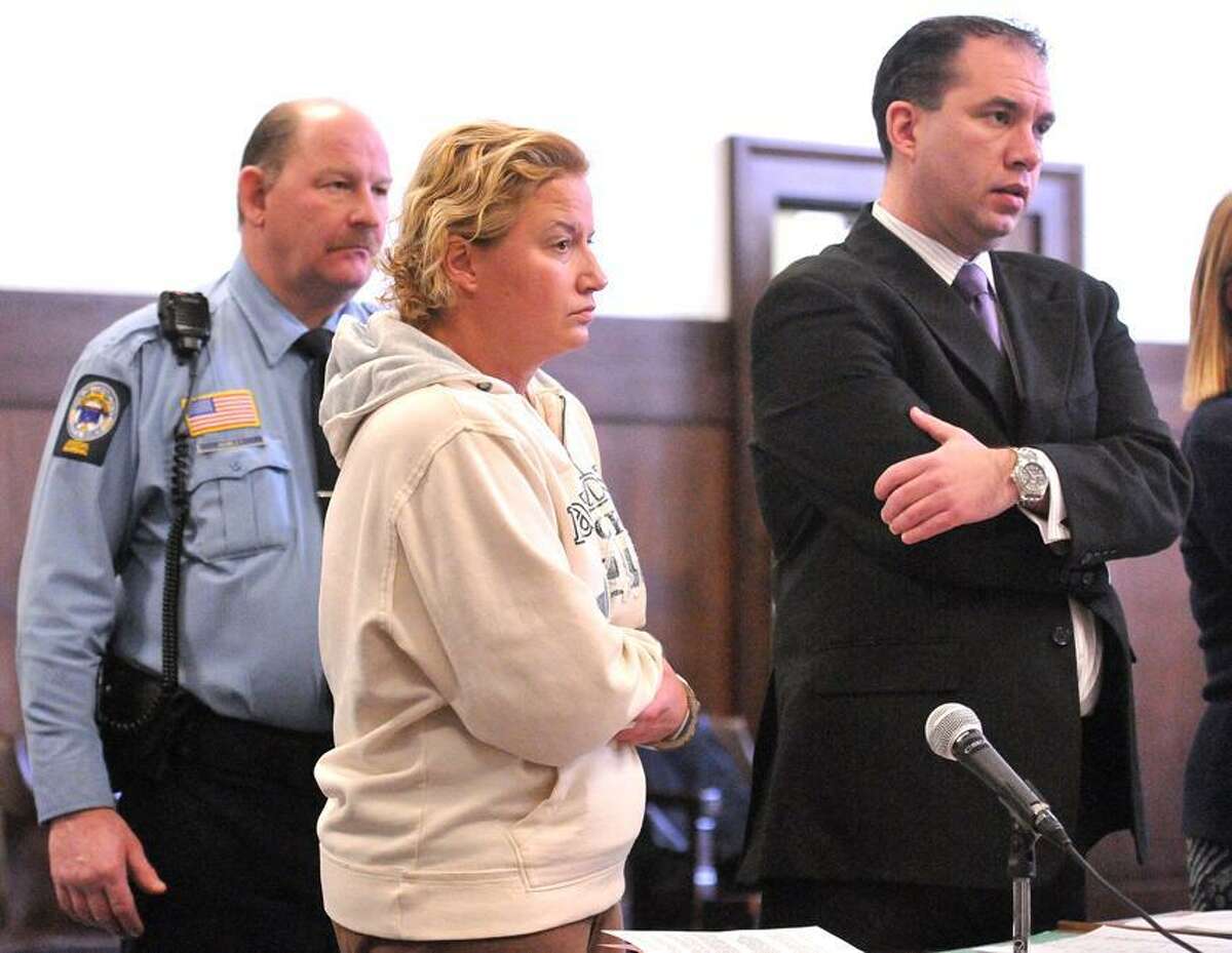 New Haven-- Tamara Sytch with her attorney, Rob Serafinowicz, at her arraignment for violation of a protective order. Photo-Peter Casolino 1/28/13