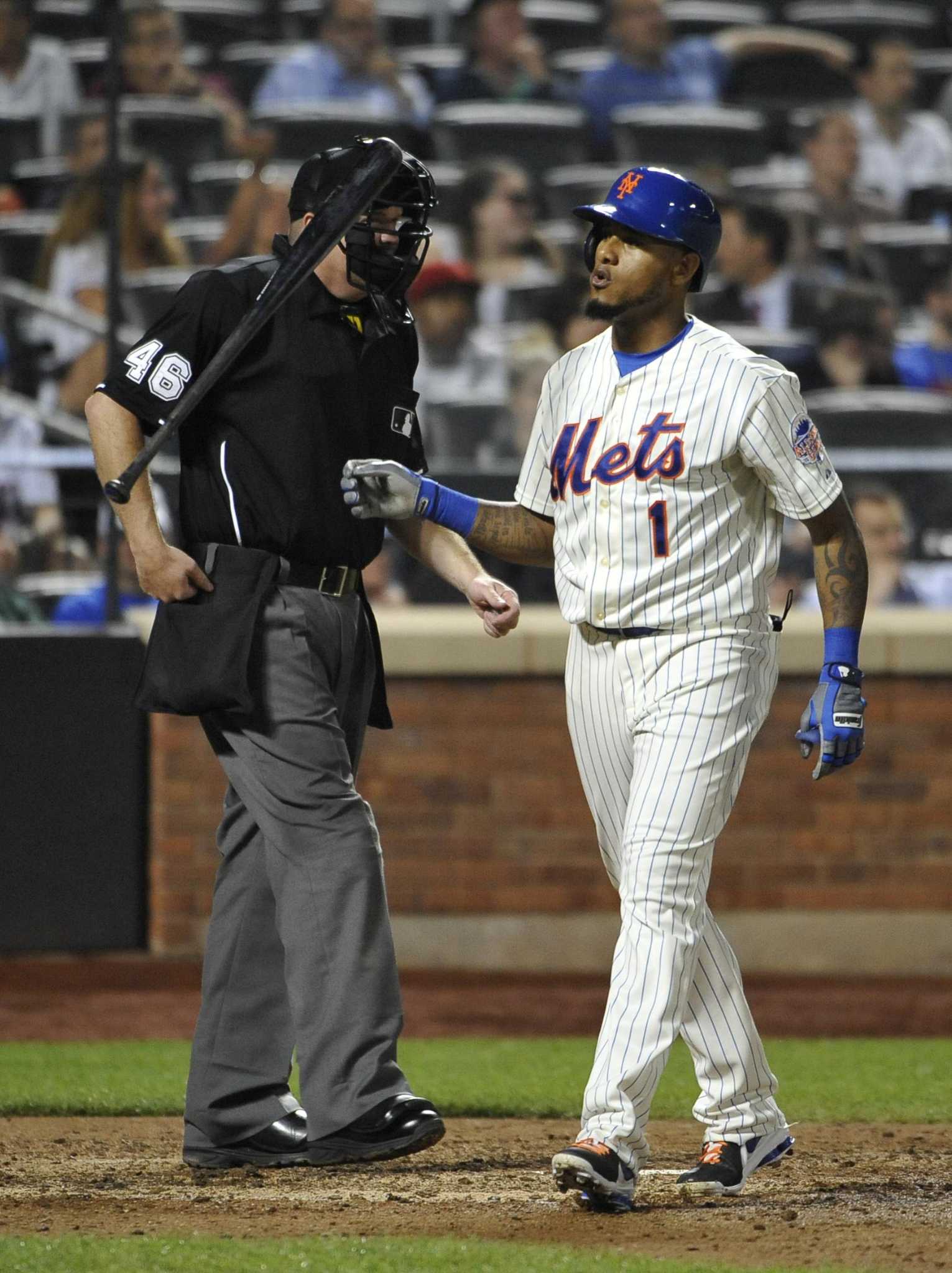 Mets third baseman David Wright slumping at bat, in field 