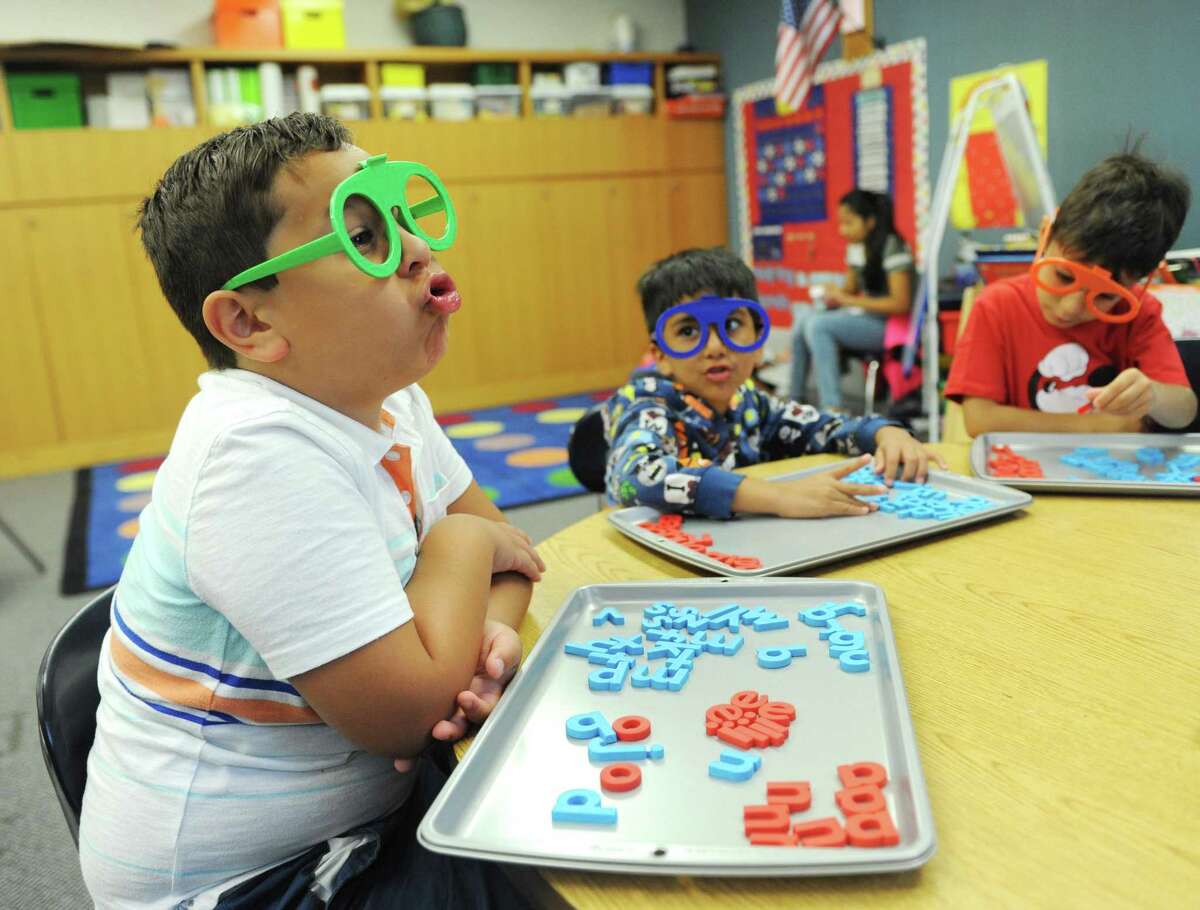 Giovanni Ayala, 6, sounds out the word "jug" before spelling it with magnetic letters during the Horizons at Brunswick Student Enrichment Program at Brunswick School in Greenwich, Conn. Tuesday, July 25, 2017. Horizons at Brunswick is an academic summer camp for low-income Greenwich public school boys who could benefit from supplemental summer learning.