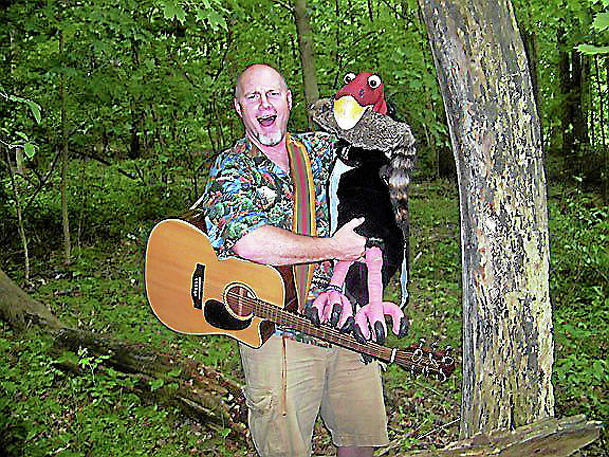 Chris Rowlands uses music, song and puppets to teach kids about the environment.