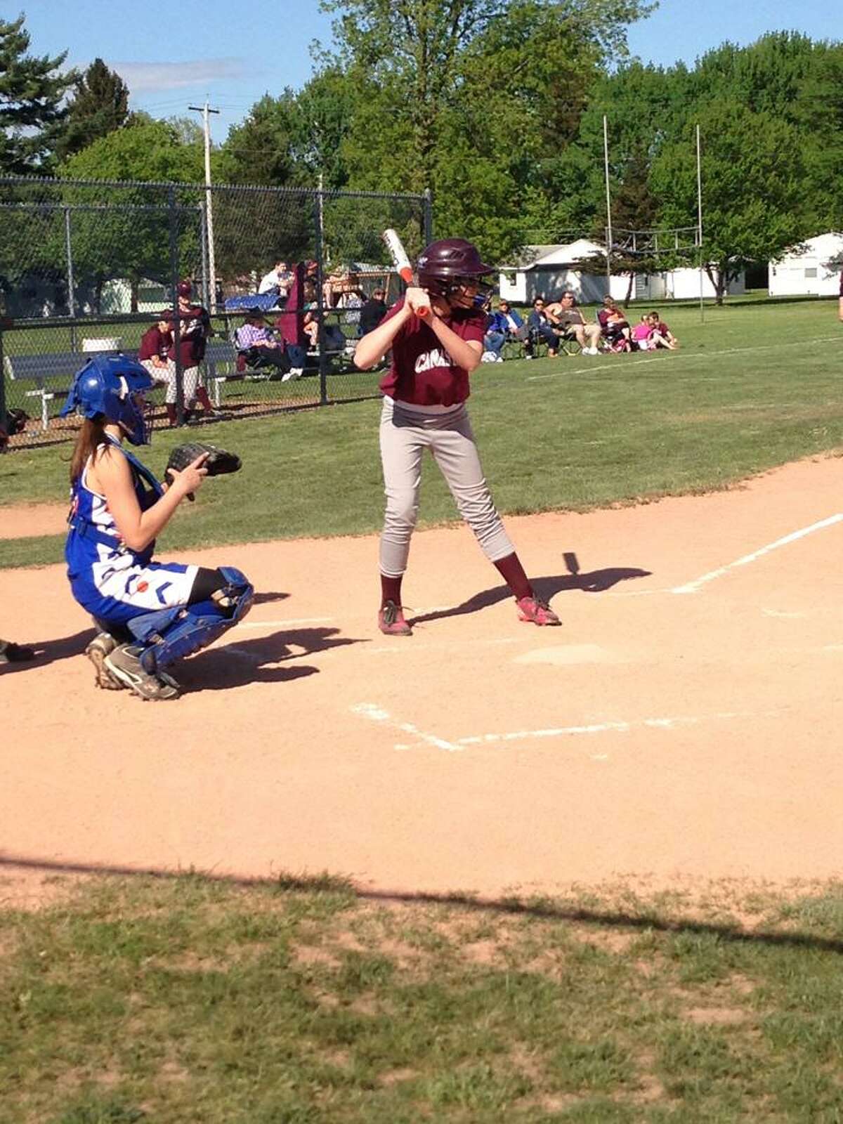 Amanda Seef/Special to the Oneida Daily Dispatch Emily Simmons steps up to the plate for Canastota's modified softball team Sunday, May 19, 2013. Her team played against New York Mills. A year ago, Emily was in a car accident that left her comatose for two months. Now she's back to school and back on the field, living each day as it comes.