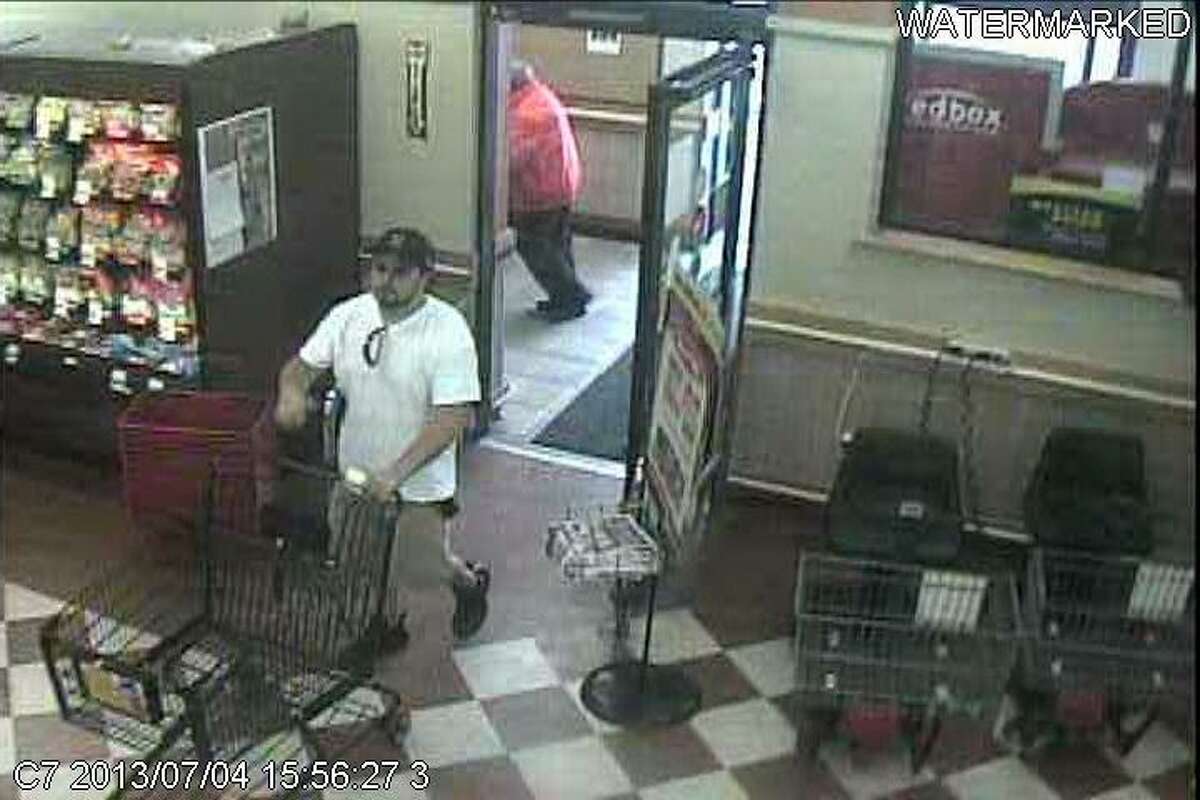 Photo provided by Sherrill City Police...Police are searching for this suspect who allegedly left the Sherrill Tops Friendly Market on July 4 without paying for a cart full of groceries.