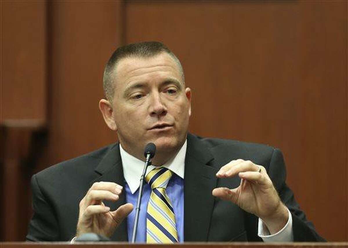 Law enforcement expert Dennis Root testifies during George Zimmerman's trial in Seminole circuit court in Sanford, Fla. Wednesday, July 10, 2013. Zimmerman has been charged with second-degree murder for the 2012 shooting death of Trayvon Martin. (AP Photo/Orlando Sentinel, Gary W. Green, Pool)