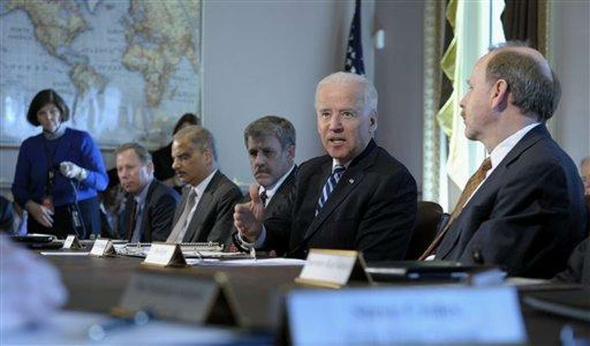 Vice President Joe Biden, second from right, gestures as he speaks during a meeting with Sportsmen and Women and Wildlife Interest Groups and member of his cabinet, Thursdayin the Eisenhower Executive Office Building on the White House complex in Washington. Biden is holding a series of meetings this week as part of the effort he is leading to develop policy proposals in response to the Newtown, Conn., school shooting. From right to left are, Ron Regan, executive director, Association of Fish and Wildlife Agencies; the vice president; Steve Williams, president, Wildlife Management Institute; and Attorney General Eric Holder. AP Photo/Susan Walsh