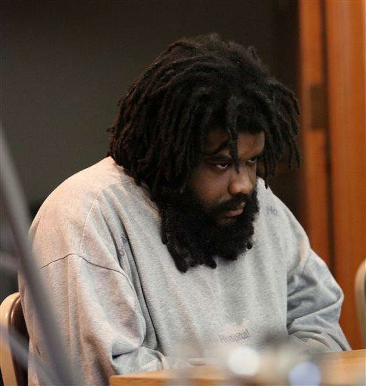 Tyree Smith sits during the first day of his trial before a three judge panel in Bridgeport, Conn., July 1, 2013. Smith is accused of killing and then eating parts of a homeless man in Connecticut. (AP Photo/The Connecticut Post, B.K. Angeletti) MANDATORY CREDIT