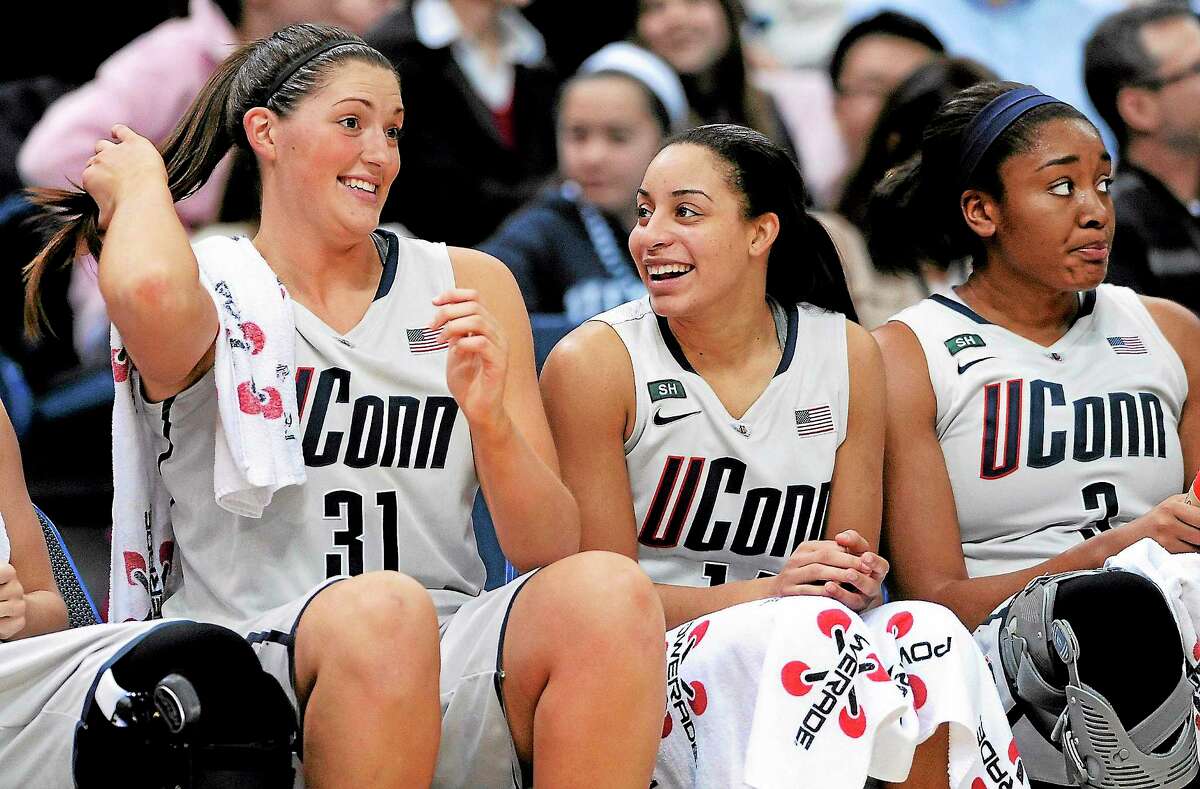 UConn’s Stefanie Dolson, left, and Bria Hartley are the two remaining Husky seniors from an original class of five. They will look to lead UConn to back-to-back national titles in their final season.