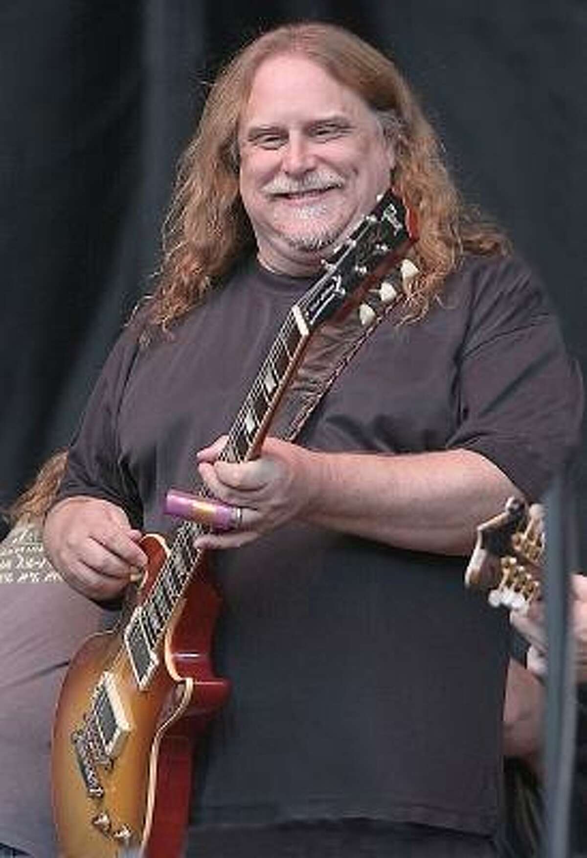 Guitarist, singer and songwriter Warren Haynes, founder of Gov't Mule and long time member of the Allman Brothers Band, is shown on stage performing during Mountain Jam in Hunter, New York.