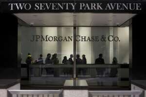 JPMorgan says its cooperating with currency-trading probes