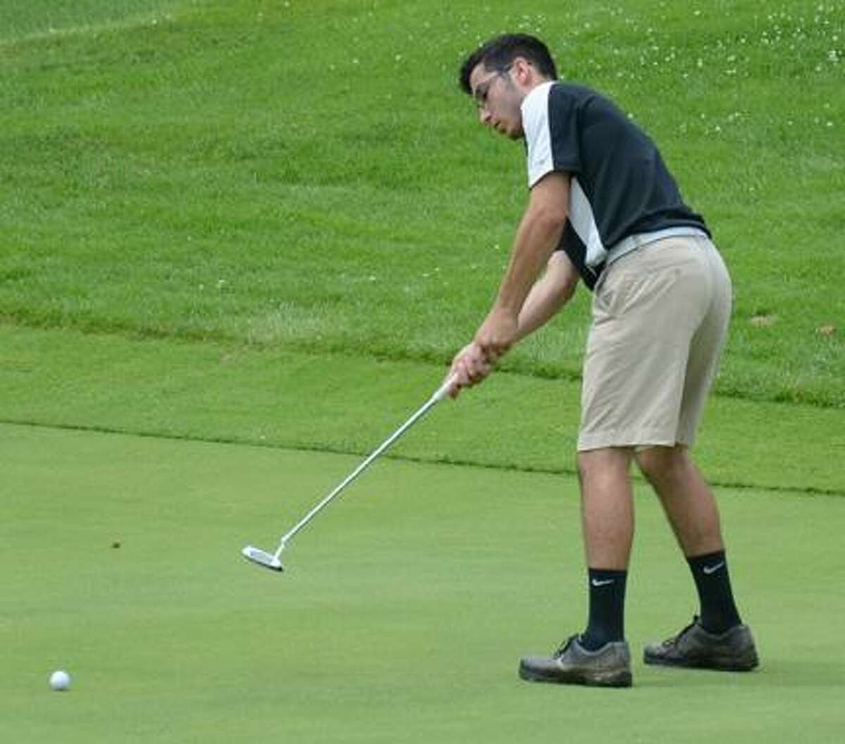 JESSI PIERCE - ONEIDA DAILY DISPATCH Camden's Evan Kessler putts during the Mohawk Valley Junior Golf Tour event at Valley View on Monday.