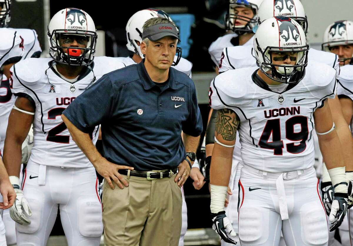 UConn interim head coach T.J. Weist will try to lead the Huskies to their first win of the season on Saturday at No. 21 Central Florida.