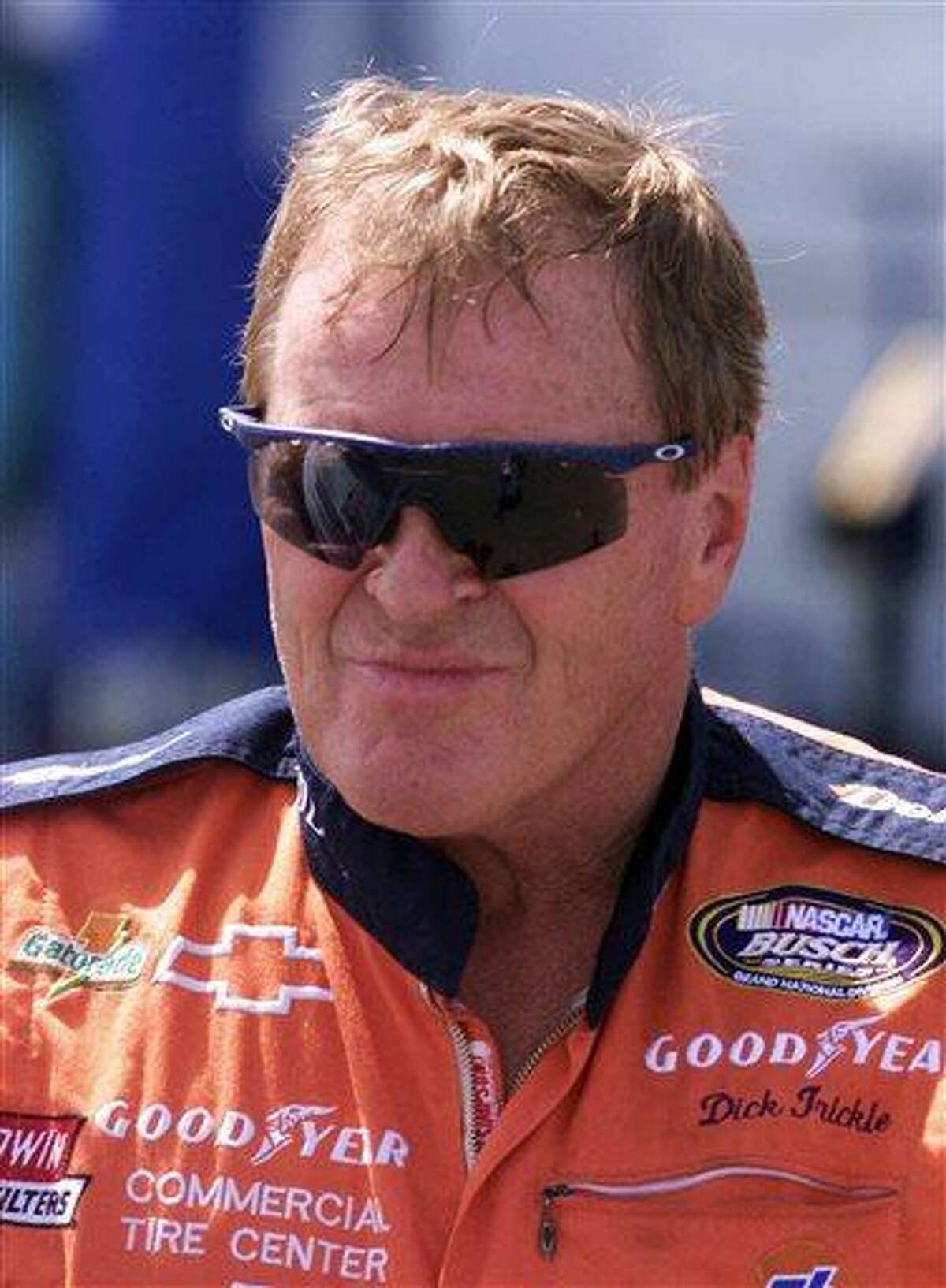 FILE - In this June 4, 1999, file photo, NASCAR driver Dick Trickle speaks to fans after qualifying on the pole position the NASCAR Busch series auto race at Dover Downs in Dover, Del. Authorities in North Carolina said Thursday, May 16, 2013, that Trickle has died of an apparent self-inflicted gunshot wound. He was 71. (AP Photo/The News Journal, Brian Branch-Price, File) NO SALES