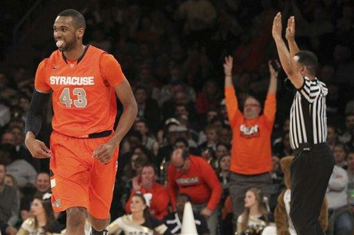 AP Photo/Mary Altaffer Syracuse's James Southerland reacts after scoring during the first half of an NCAA college basketball game against Pittsburgh at the Big East Conference tournament, Thursday, March 14, 2013 in New York.