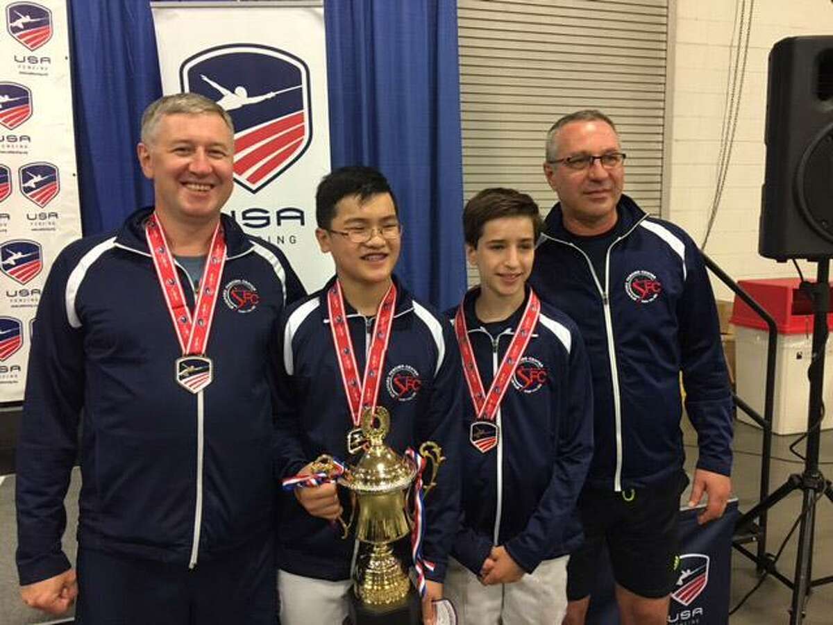 From left to right, coach Alex Fotiyev, Brunswick student John Lin, Nicky Wind and coach Oleg Tretyak gather at the 2017 National Fencing Championships in Salt Lake City, Utah. Lin won the sabre event title and Wind placed eighth. Both fencers represented Stamford Fencing Center.