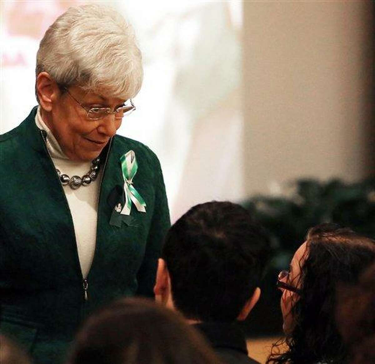 Conn. Lt. Governor Nancy Wyman speaks with Donna Soto mother of slain Sandy Hook Elementary School teacher Victoria Soto before a memorial to her daughter at Eastern Connecticut State University, Saturday March 9, 2013 in Willimantic, Conn The university gathered to remember the 2008 graduate who sacrificed her life to save her students during the December 14, 2012 school shooting where twenty children and six adults were slain by Adam Lanza. Soto was remembered by friends, university staff and family as a dedicated student and a caring individual. (AP Photo/Journal Inquirer, Jared Ramsdell)