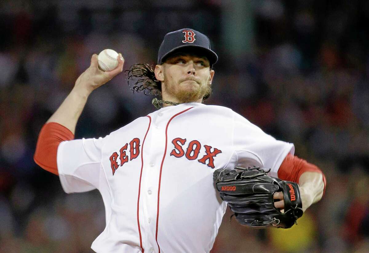 Red Sox starting pitcher Clay Buchholz throws in the first inning of Game 6 of the American League championship series on Saturday in Boston.