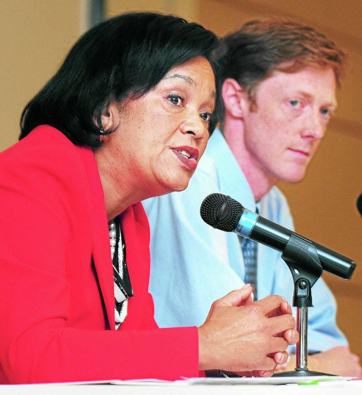 (Arnold Gold — New Haven Register) New Haven mayoral candidate Toni Harp (left) answers a question during a debate with Justin Elicker (right) at Gateway Community College in New Haven on 10/22/2013.