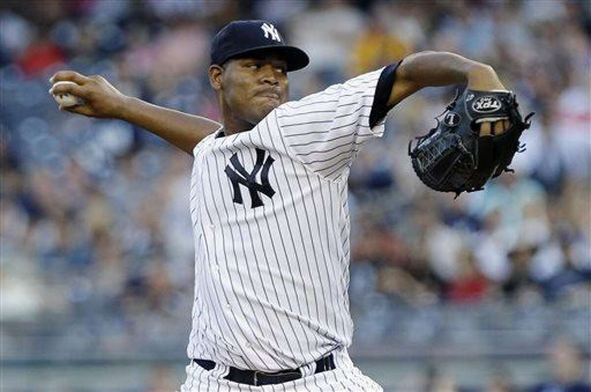 New York Yankees' Ivan Nova delivers a pitch during the first inning of a baseball game against the Baltimore Orioles, Friday, July 5, 2013, in New York. (AP Photo/Frank Franklin II)