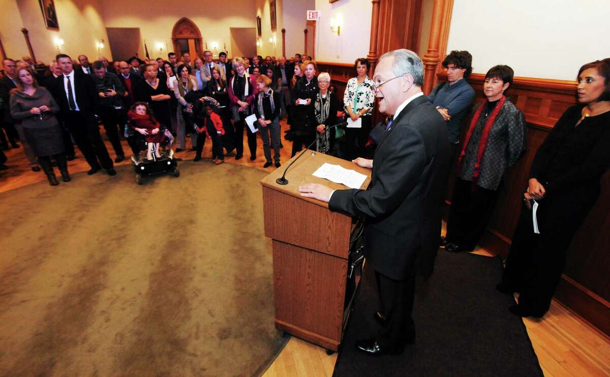 (Mara Lavitt — New Haven Register) December 19, 2013 New Haven Mayor John DeStefano Jr. addresses current and former staff and friends before unveiling his official portrait, in City Hall.