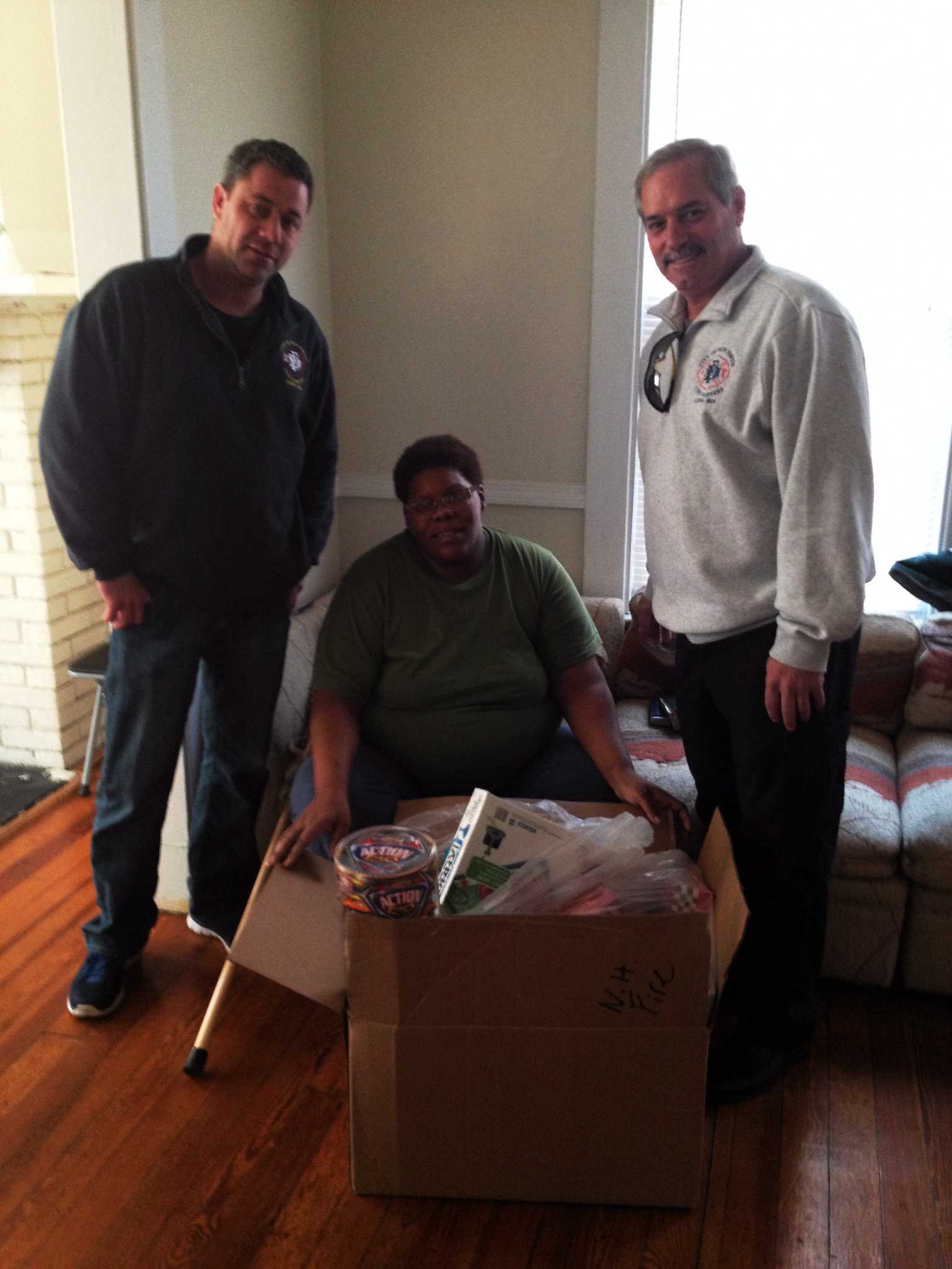 New Haven firefighters donate toys to families burned out on Kossuth Street