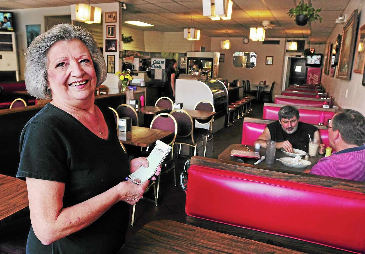 RANDALL BEACH Mary’s flock of customers line up to thank her, with love