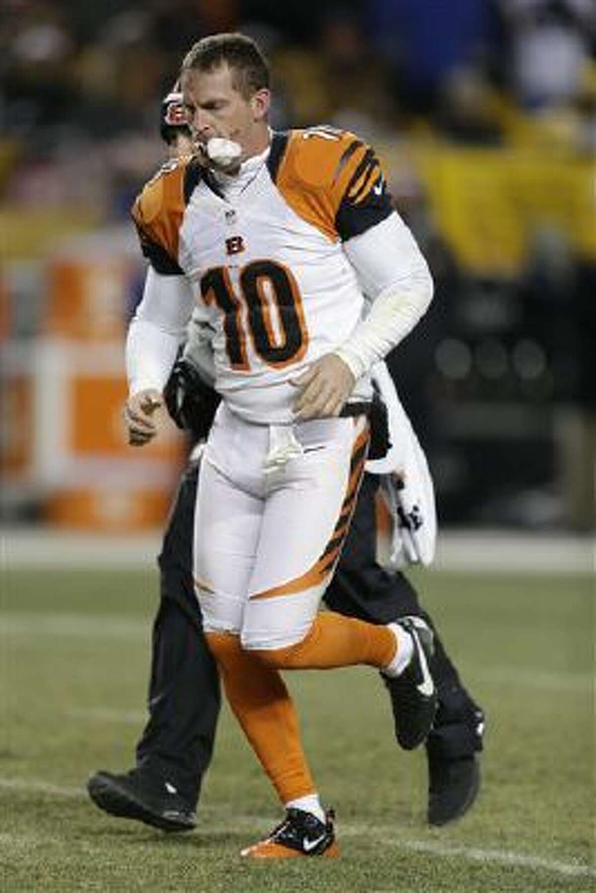 Cincinnati Bengals punter Kevin Huber (10) is taken from the field after being injured in the first half of an NFL football game between the Pittsburgh Steelers and the Cincinnati Bengals on Sunday, Dec. 15, 2013 in Pittsburgh.