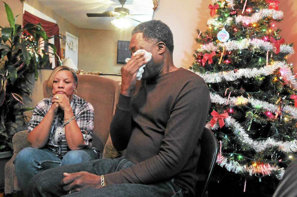 Celeste and Gregory Fulcher, parents of Key Club shooting victim Erika Robinson, at home in West Haven.