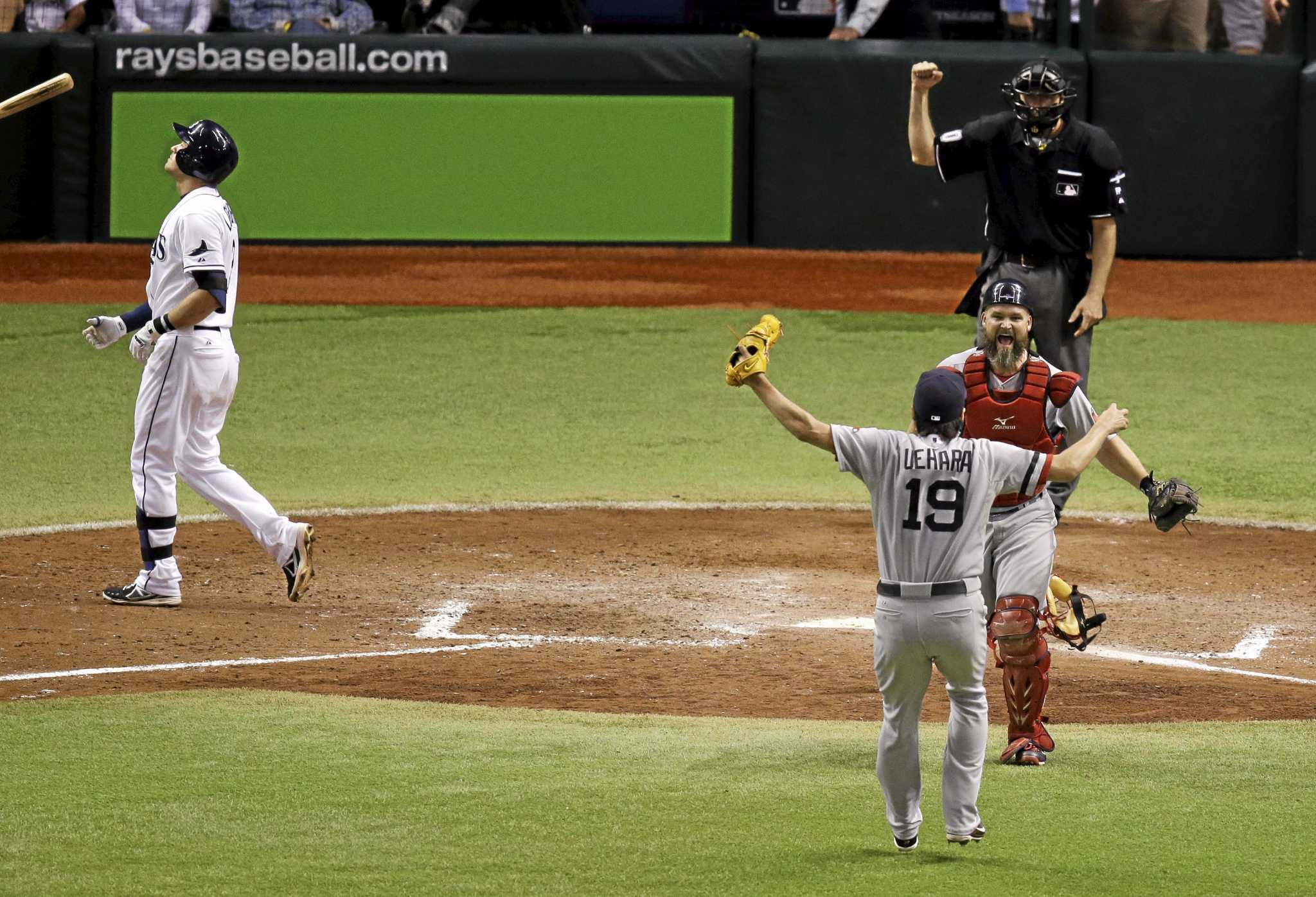 Boston Red Sox closing pitcher Koji Uehara (19) celebrates with