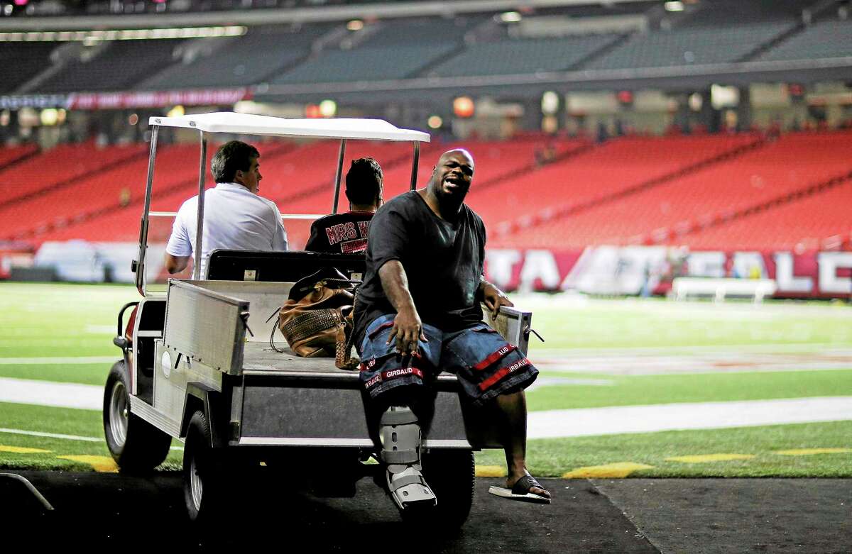 New England Patriots defensive tackle Vince Wilfork is transported out of the Georgia Dome after he was injured during the second half of Sunday night’s game against the Atlanta Falcons.