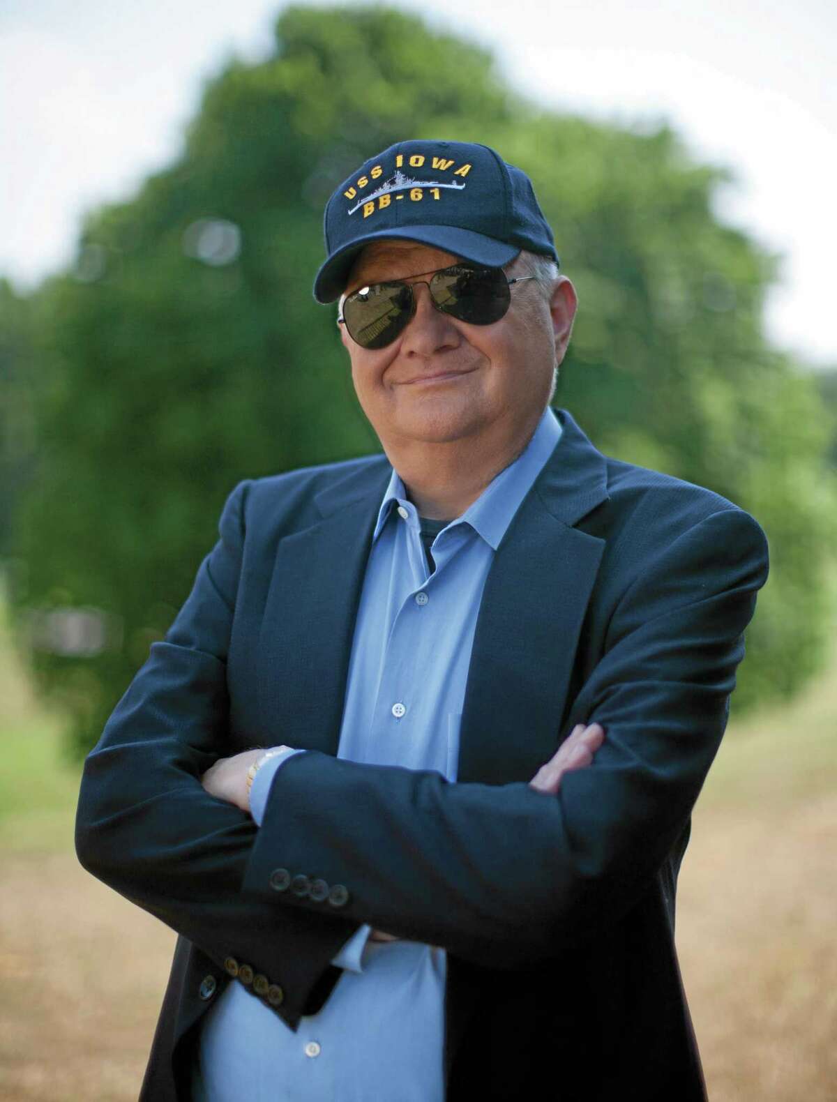 This 2010 image released by G.P. Putnam Sons shows author Tom Clancy in Huntingtown, Md. Clancy, the bestselling author of "The Hunt for Red October" and other wildly successful technological thrillers, has died. He was 66. Penguin Group (USA) said Wednesday that Clancy died Tuesday in Baltimore. The publisher did not disclose a cause of death. (AP Photo/G.P. Putnam Sons, David Burnett)