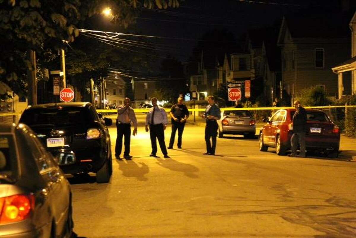Investigators on the scene of the shooting in New Haven Thursday night. Rich Scinto/New Haven Register.