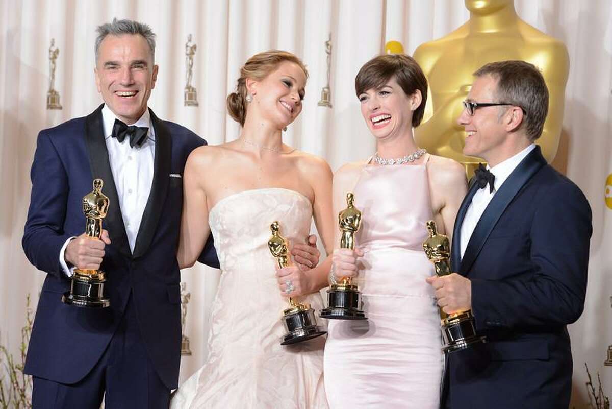 Oscar winners Daniel Day-Lewis, Jennifer Lawrence, Anne Hathaway and Christoph Waltz backstage at the 85th Academy Awards at the Dolby Theatre in Los Angeles, California on Sunday Feb. 24, 2013 ( David Crane, staff photographer)