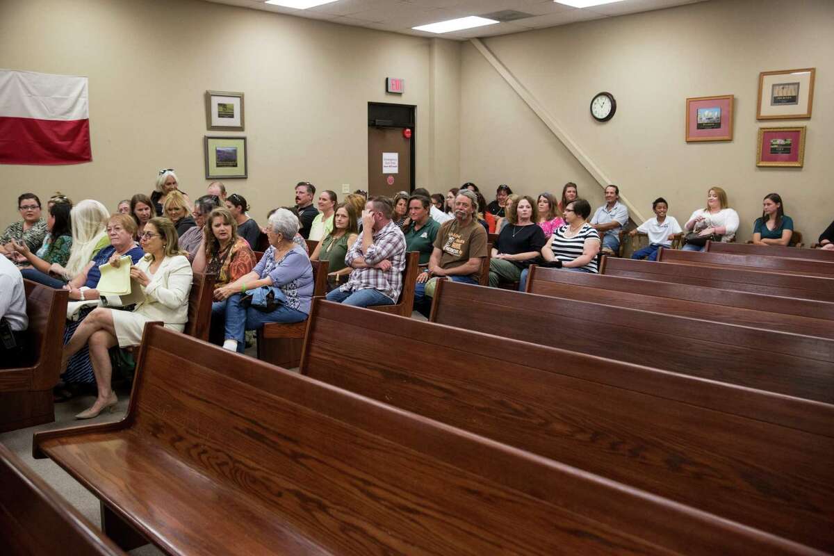 Supporters of Meadow Haven Horse Rescue sit on one side of the court room before a hearing at Bexar County Precinct 4 in San Antonio, Texas on July 25, 2017. The hearing was about whether the custody of 46 horses removed because of neglect will go back to the owner Andrew Schwartz or to Meadow Haven Horse Rescue, where the horses are currently being kept.