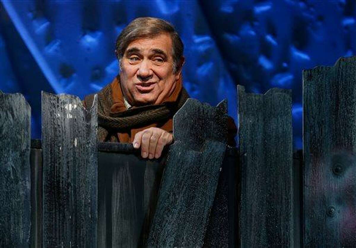 This theater publicity image released by Keith Sherman & Associates shows Dan Lauria during a performance of "A Christmas Story." Producers on Wednesday, Aug. 7, 2013, announced that "The Wonder Years" veteran will return to narrate the zaniness when the musical plays The Bushnell in Hartford, Conn., from Nov. 12-17, and The Wang Theatre in Boston from Nov. 20-Dec. 8, before landing at The Theater at Madison Square Garden from Dec. 11-29. (AP Photo/Keith Sherman & Associates, Carol Rosegg)