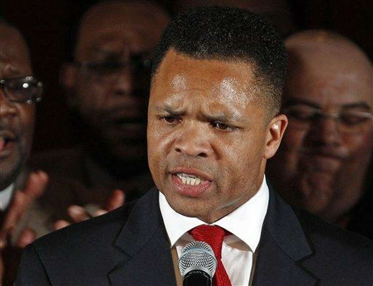 FILE - In this March 20, 2012, file photo taken in Chicago, then-Rep. Jesse Jackson Jr., D-Ill. speaks at a Democratic primary election night party. Jackson and his wife are to appear in federal court to answer criminal charges that they engaged in an alleged scheme to spend $750,000 in campaign funds on personal items. (AP Photo/M. Spencer Green, File)