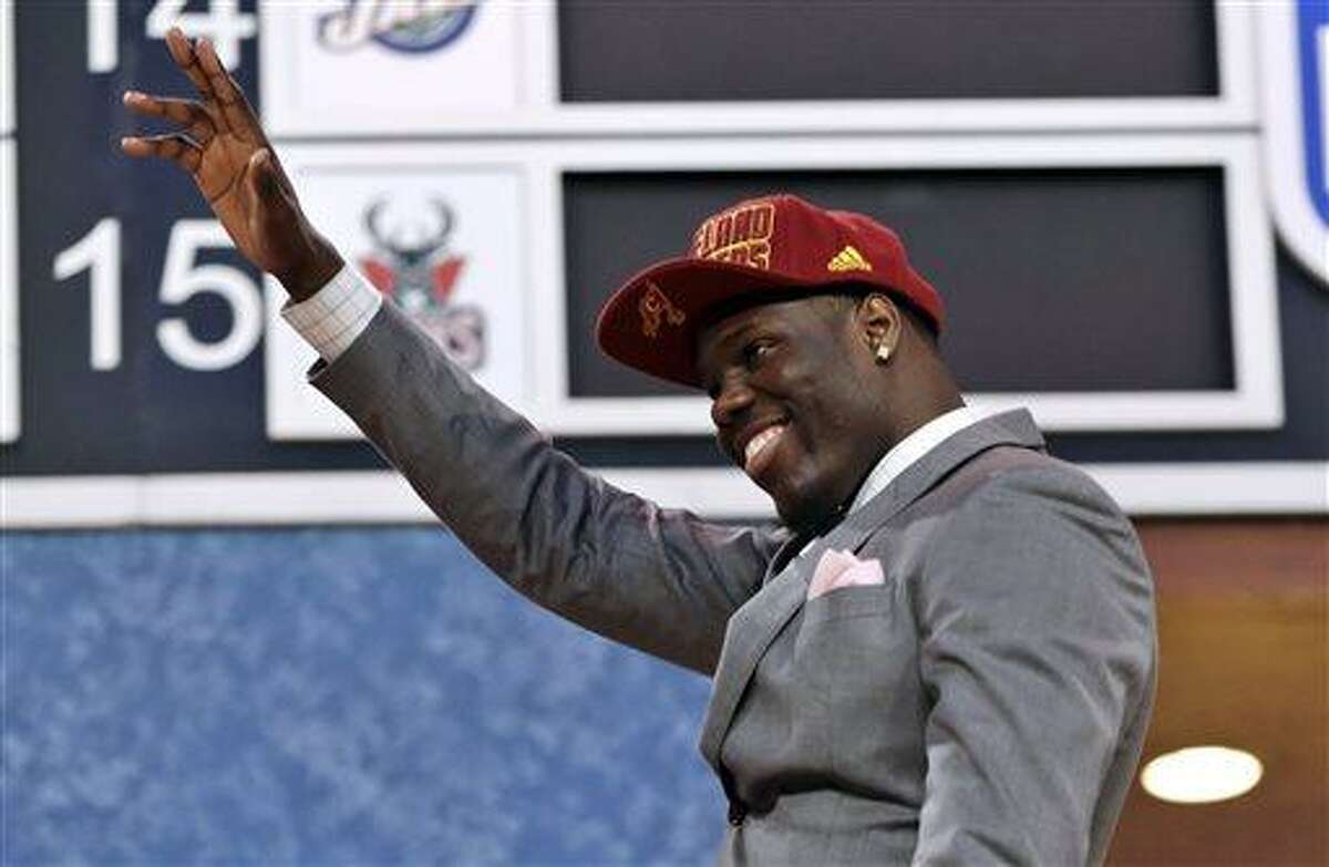 UNLV's Anthony Bennett waves after being selected first overall by the Cleveland Cavaliers in theNBA basketball draft, Thursday, June 27, 2013, in New York. (AP Photo/Kathy Willens)