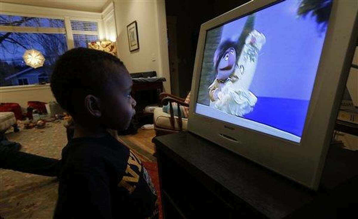 AP Photo/Ted S. Warren Joe Jensen, 2, watches television as a special treat in the afternoon, Tuesday, Feb. 12, 2013 at his home in Seattle. Joe's mother, Nancy Jensen, was a participant in a new University of Washington study on the effects of television viewing on kids that will be published Monday, Feb. 18, 2013.