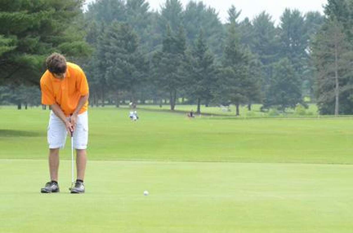 KYLE MENNIG - ONEIDA DAILY DISPATCHChad Finch putts on the ninth green during the Mohawk Valley Junior Golf Tour event at Crestwood on Tuesday, June 25, 2013.
