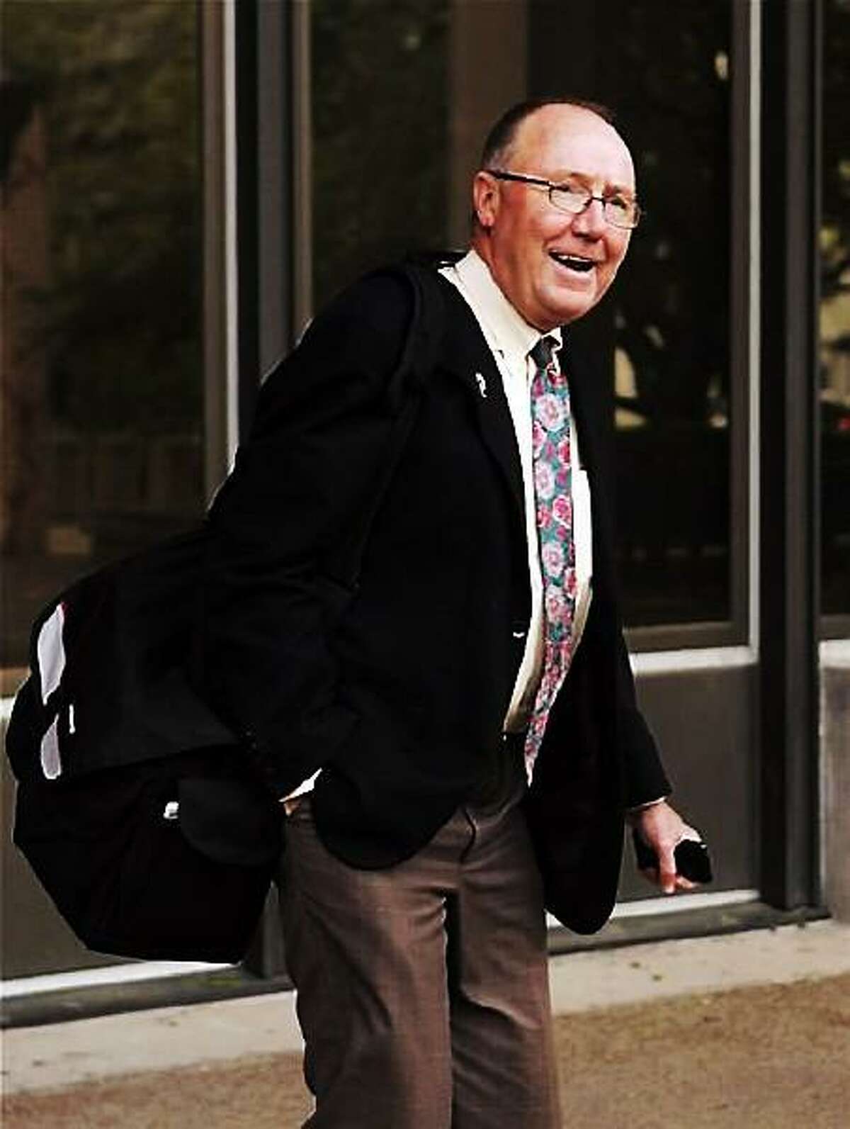Quinnipiac University athletic director Jack McDonald leaves U.S. District Court in Bridgeport, Conn., Monday, May 11, 2009. McDonald was testifying in a lawsuit brought against the university for proposing to eliminate the women's volleyball team. (AP Photo/Bob Child)