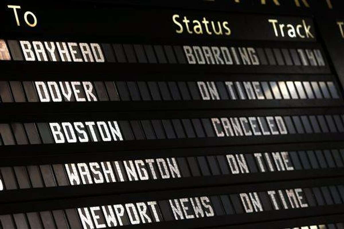The Amtrak departures board shows a canceled train to Boston at Penn Station, Friday, April 19, 2013 in New York. Mass transit to and from the Boston area was virtually shut down Friday as police conducted a massive manhunt for a suspect in Monday's Boston Marathon bombing. (AP Photo/Jason DeCrow)