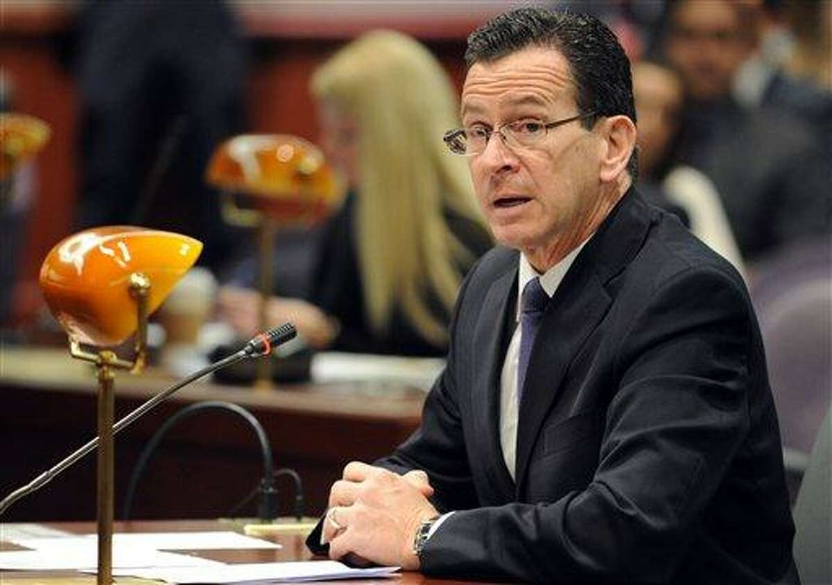 Connecticut Gov. Dannel Malloy addresses the Sandy Hook Advisory Commission at their first meeting Thursday, Jan. 24, 2013 at the Legislative Office Building in Hartford, Conn. (AP Photo/The Connecticut Post, Autumn Driscoll) MANDATORY CREDIT