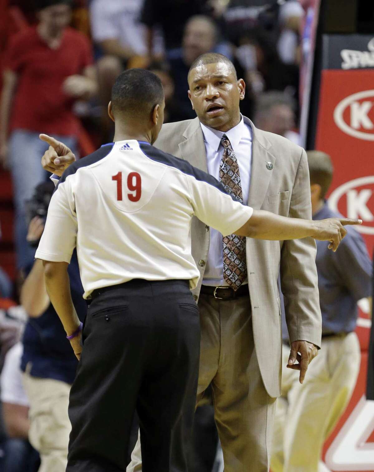Boston Celtics head coach Doc Rivers, rear, argues a call with referee James Capers (19) during the second half of an NBA basketball game against the Miami Heat, Friday, April 12, 2013 in Miami. The Heat defeated the Celtics 109-101. (AP Photo/Wilfredo Lee)