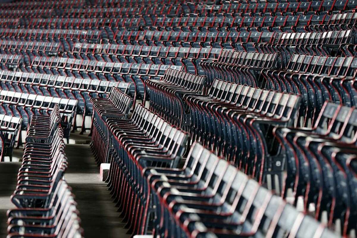 Seats at Fenway Park before a baseball game between the Boston Red Sox and the Tampa Bay Rays in Boston, Saturday, April 13, 2013. (AP Photo/Michael Dwyer)