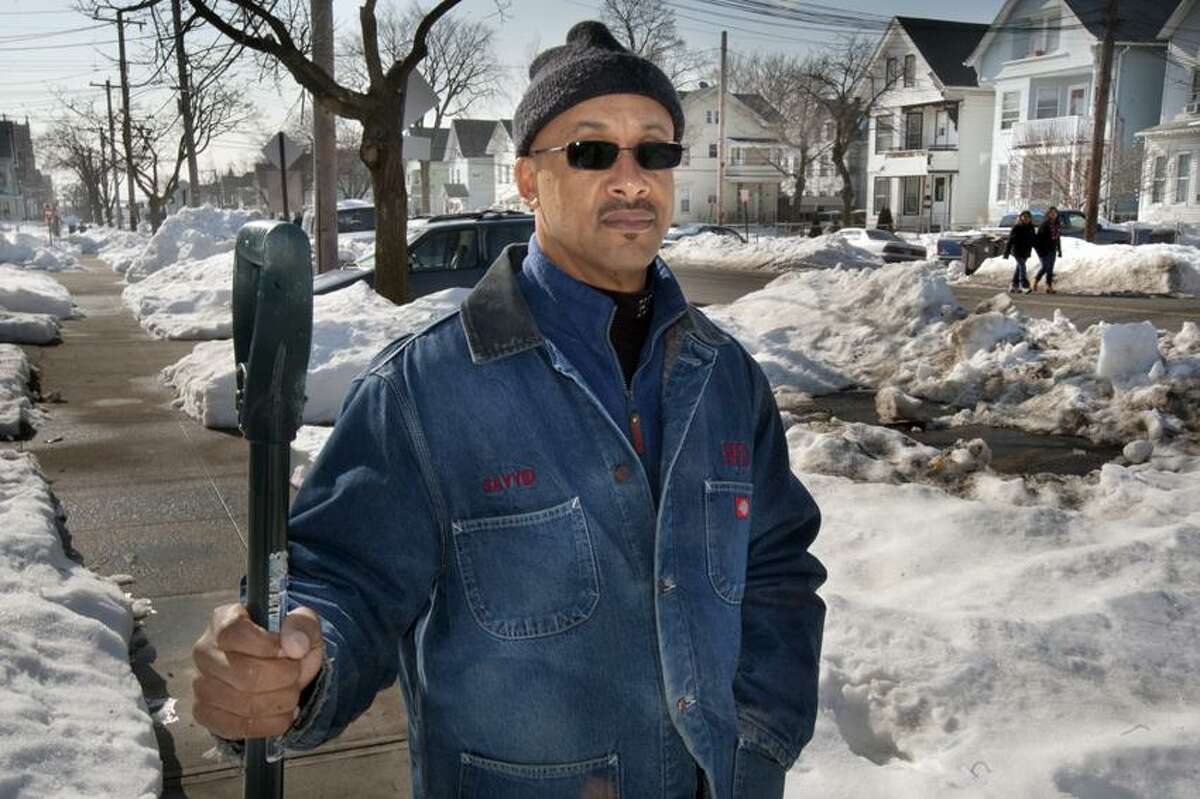Mr. Sayyid Abdur Rahman, pictured, was helped by two young men last Friday removing his car from being stuck in the snow- then they turned on him and rob him at gun point February 15, 2013. vmWilliams