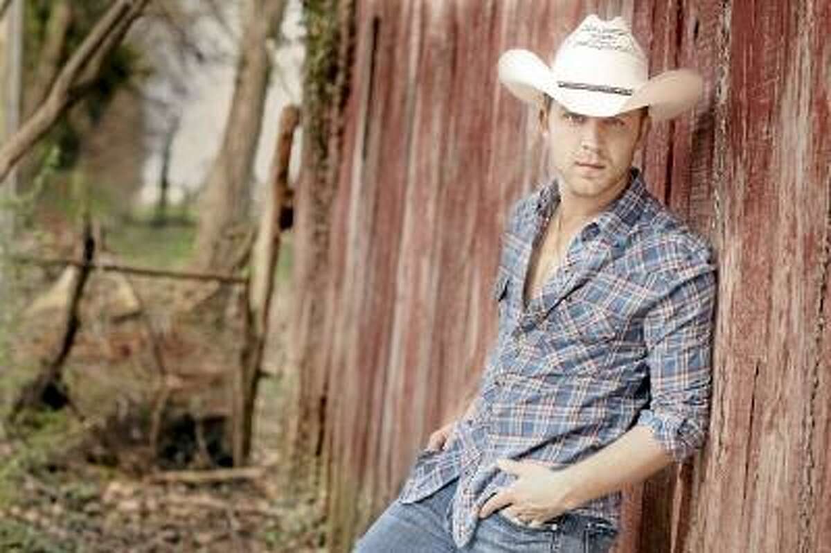Submitted photo Justin Moore will be performing at the Durham Fair on Friday, Sept. 27, at 7:30 p.m., as a headline entertainer. Moore has toured with Hank Williams Jr., Brad Paisley, Miranda Lambert, Rascal Flatts and Blake Shelton.