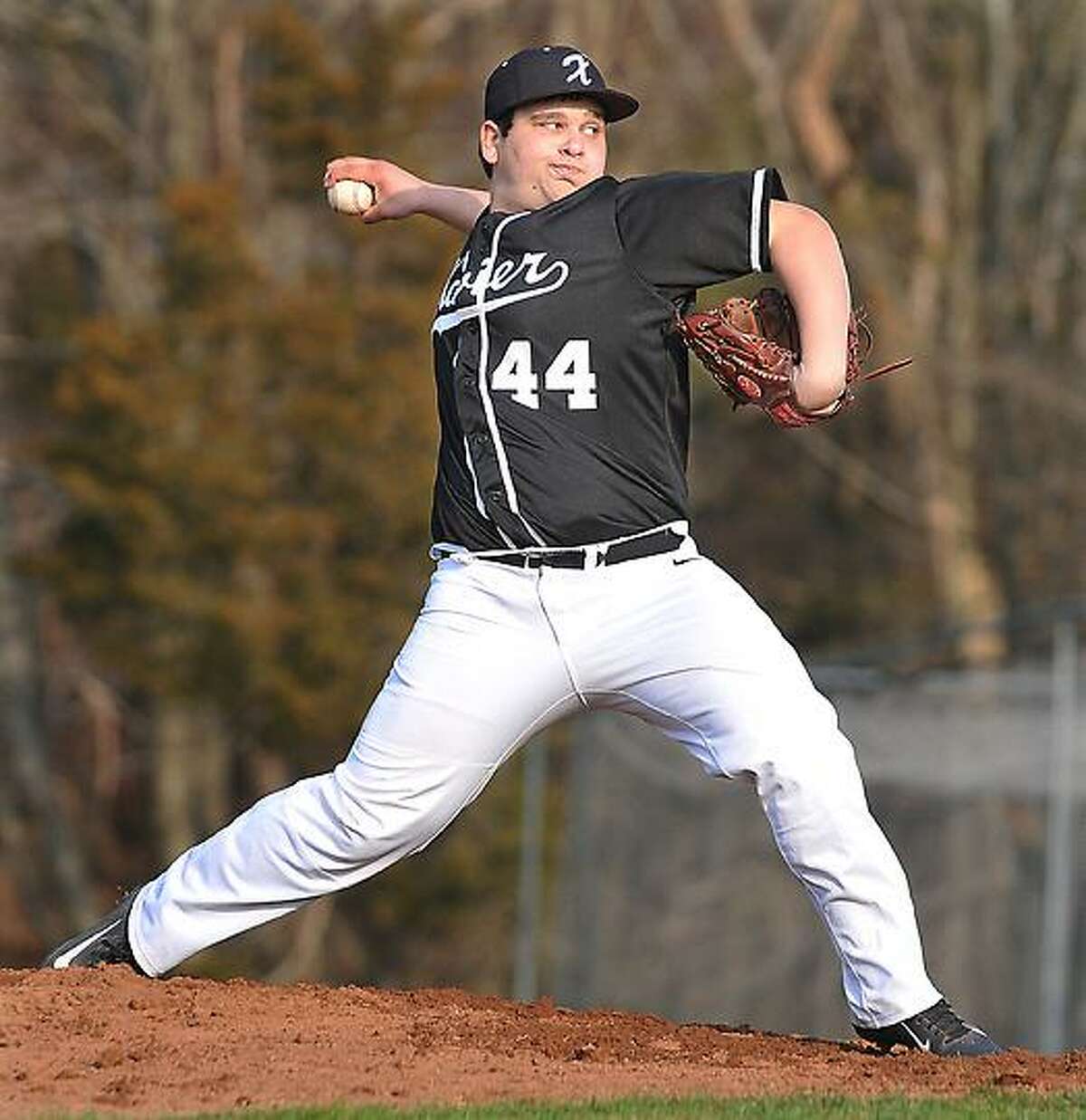 Catherine Avalone/The Middletown Press In this file photo, Xavier sophomore John Signore pitches in the seventh inning against Fairfield Prep earlier this season.