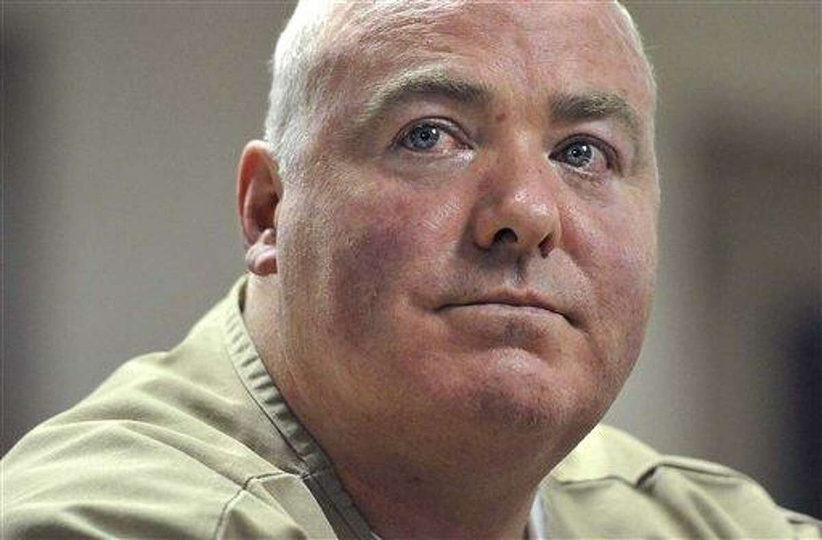 Michael Skakel listens during a parole hearing at McDougall-Walker Correctional Institution in Suffield, Conn. Prosecutors want a judge to dismiss Michael Skakel's latest challenge of his 2002 murder conviction, saying the Kennedy cousin's claim that his trial attorney did a poor job should have been raised in an earlier appeal and that many of the issues he cites were previously rejected, Wednesday, Feb. 13, 2013. AP Photo/Jessica Hill
