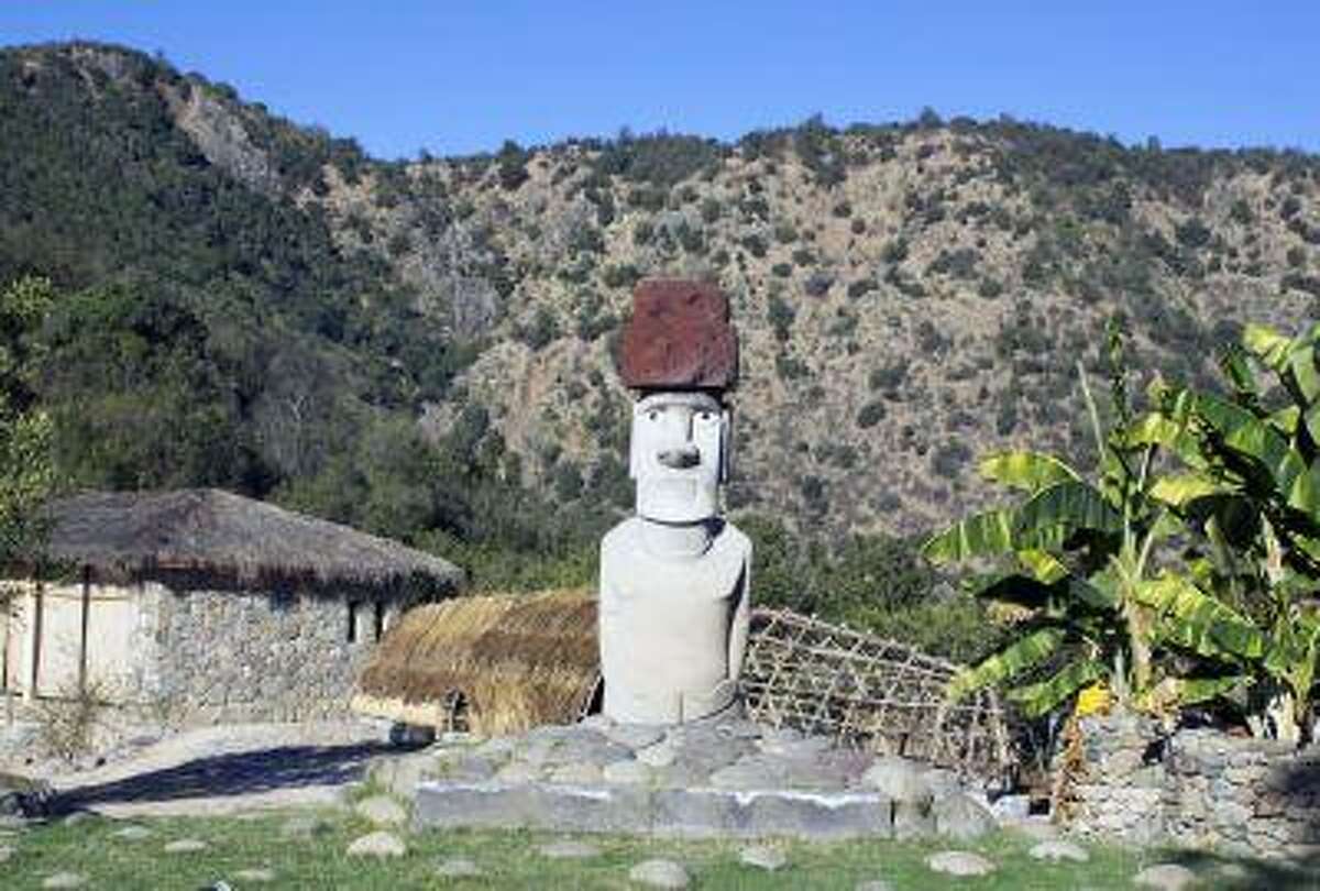 A faux-moai statue stands at the Vina Santa Cruz winery in Lolol in Chile's Colchagua Valley in March 2013. The real moai statues are found on Easter Island (Rapa Nui), which is controlled by Chile. (Tim O'Rourke/Bay Area News Group)