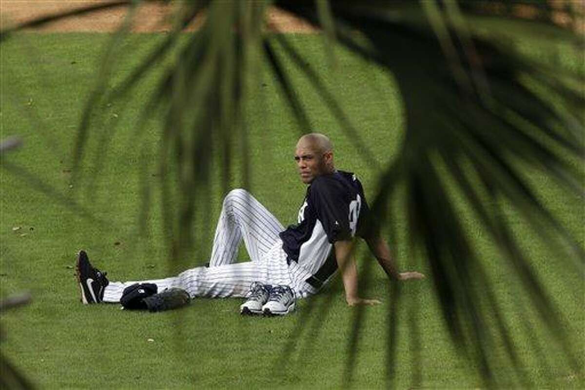 New York Yankees' Mariano Rivera rests after a workout at baseball spring training, Wednesday, Feb. 13, 2013, in Tampa, Fla. (AP Photo/Matt Slocum)