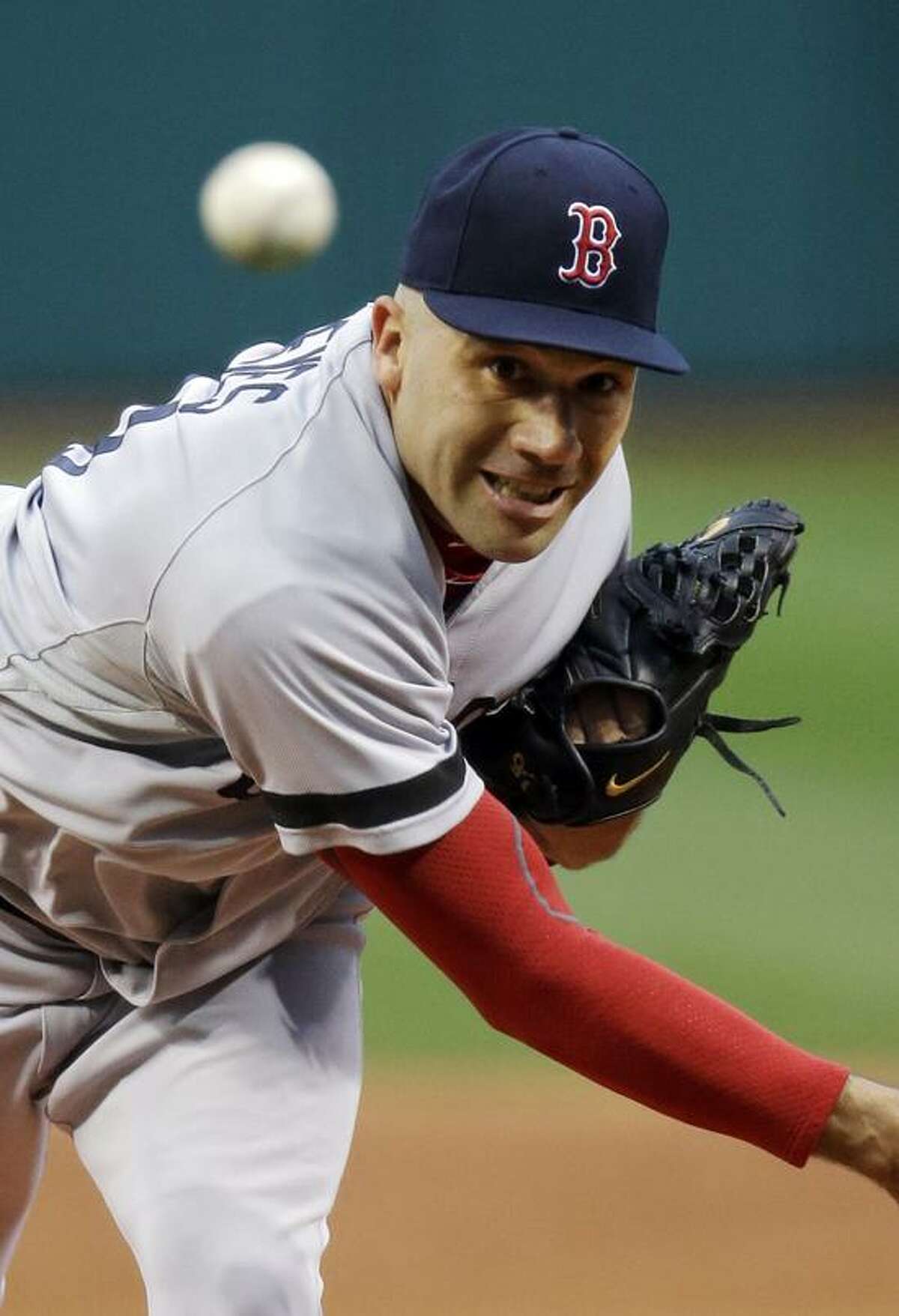 Boston Red Sox starting pitcher Alfredo Aceves delivers against the Cleveland Indians in the first inning of a baseball game Wednesday, April 17, 2013, in Cleveland. (AP Photo/Mark Duncan)