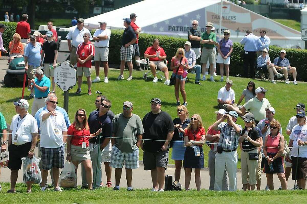 Peter Hvizdak Ñ RegisterCrowd watches Justin Rose on the first tee during the first round of golf Thursday June 20, 2013 of the PGA 2013 Travelers Championship at the Tournament Players Club River Highlands in Cromwell, Conn.